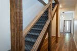 Floor 1 has a modern rustic esthetic and is the main entryway of the home.
